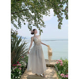 2025 High-End Design White Temperament Early Spring French Holiday Hanging Neck Hollow Embroidery Tying Dress