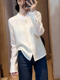New Chinese Elegant High-End Temperament Apricot-Color Top Woman 2026 Early Spring Lady Bailing Age Reduction Style Thin Shirt